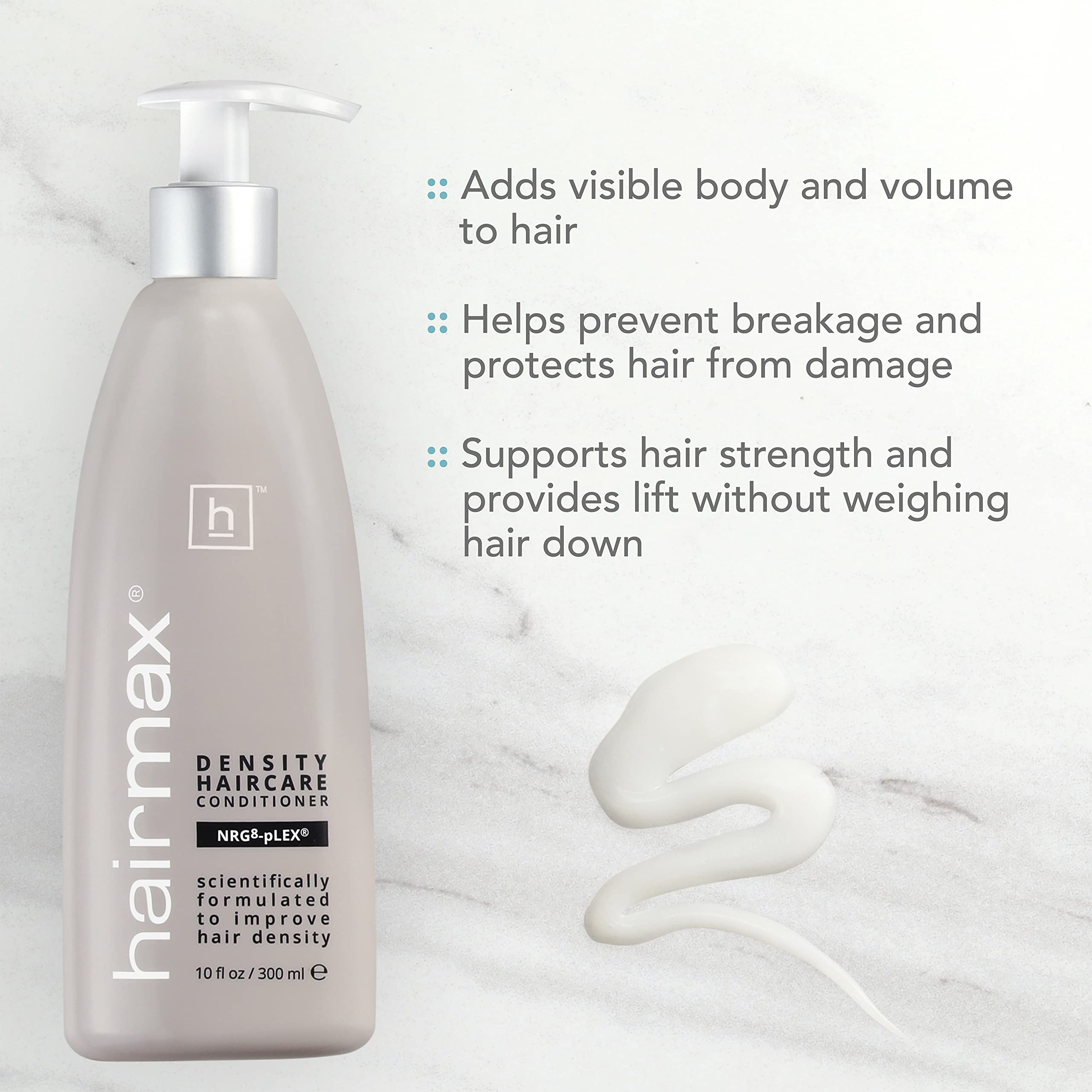 Hairmax Density Booster bottle; liposome-activated formula calms scalp signals.