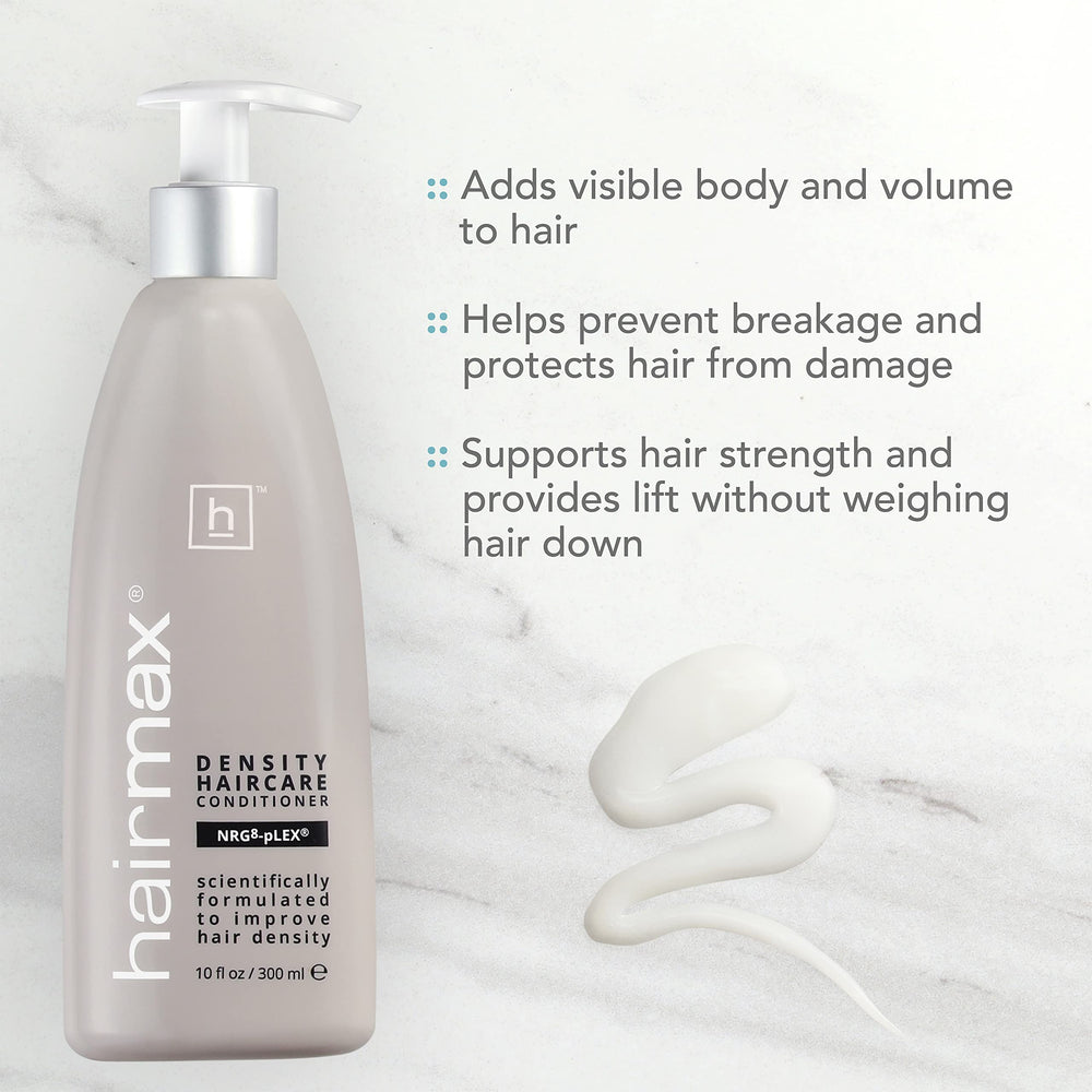 Hairmax Density Booster bottle; liposome-activated formula calms scalp signals.