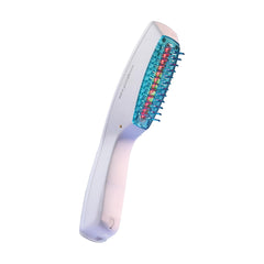 HairMax Ultima 12 LaserComb in use on scalp during a home treatment session.