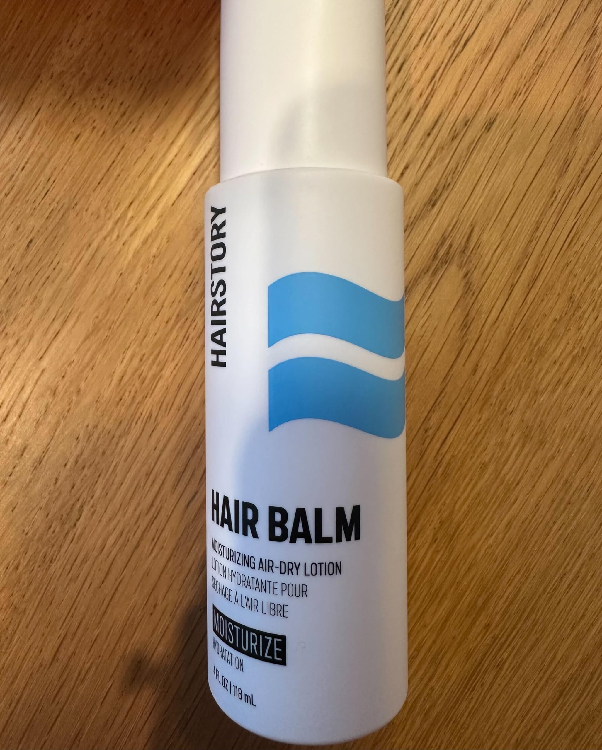 Hairstory Soft shine achieved on finished hair with Hair Balm.