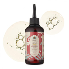 HairTry Babyhair Fever bottle pour demonstrates direct scalp application for nourishing roots