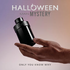 Halloween Man Mystery bottle close-up reveals woodsy notes and masculine depth.