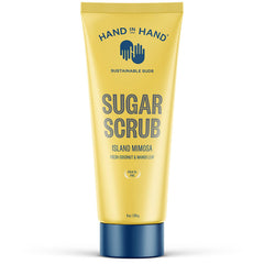 Hand in Hand Sugar Scrub bottle closeup, tropical Island Mimosa scent enhances shower routine and smooths skin.