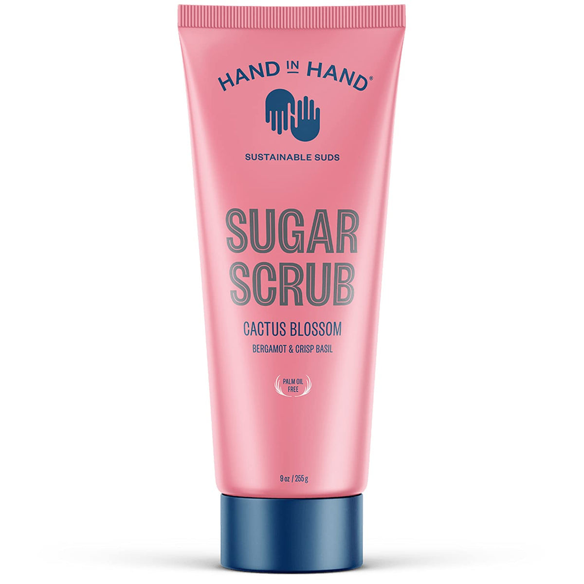 Hand in Hand Sugar Scrub bottle pour demonstrates easy application and gentle exfoliation.