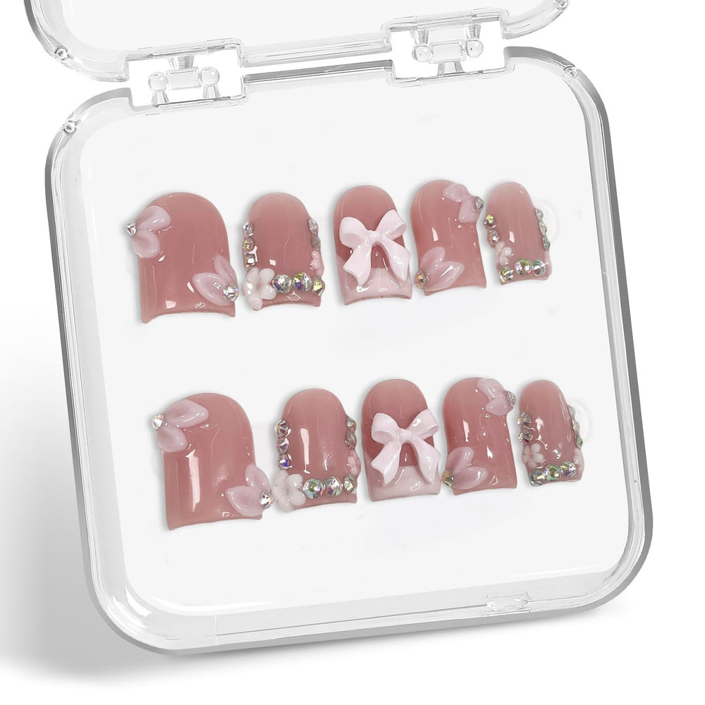 Handmade press-on nails with 3D flower and rhinestones for elegant occasions.