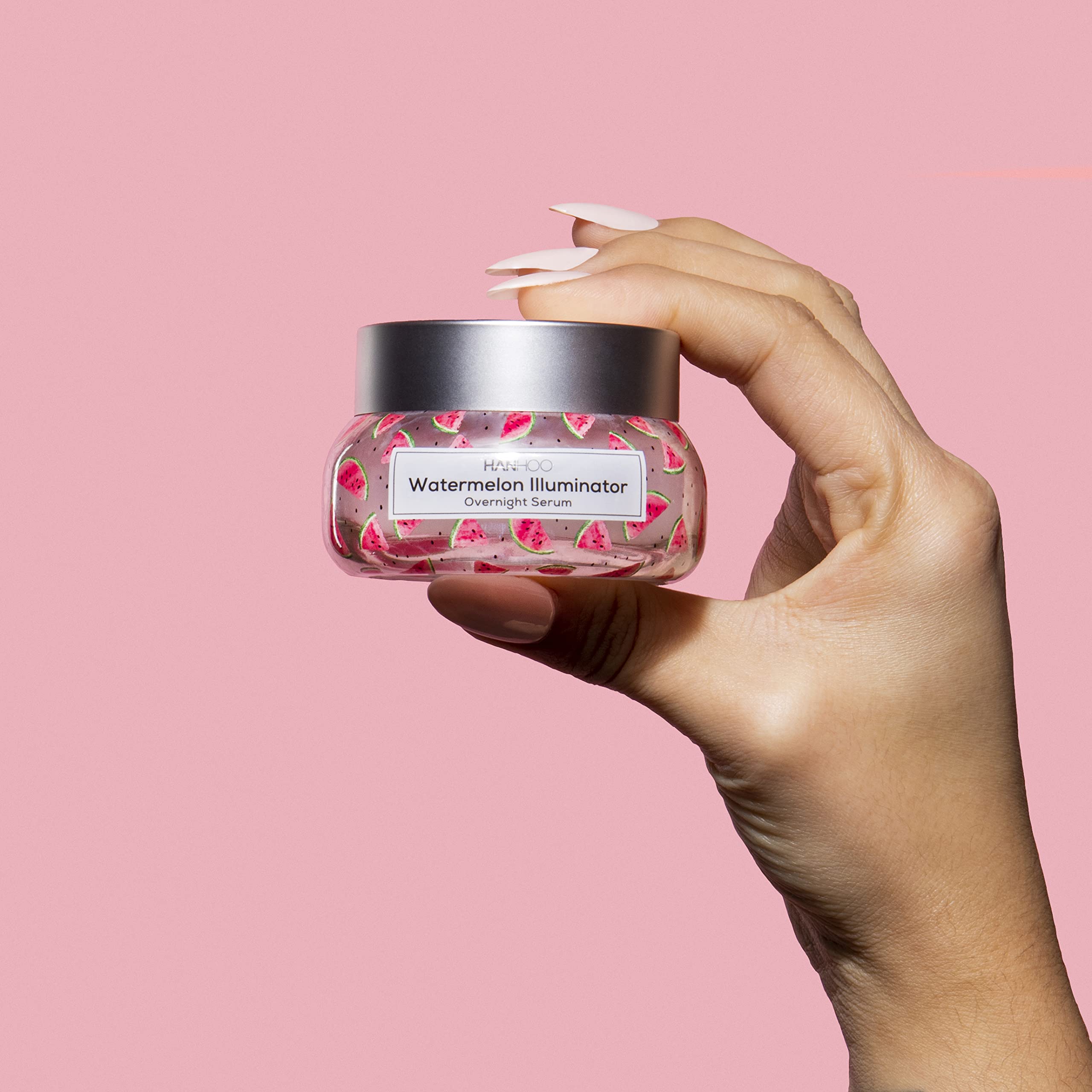 Hanhoo Watermelon Illuminator bottle on dresser evokes a nightly self-care ritual.