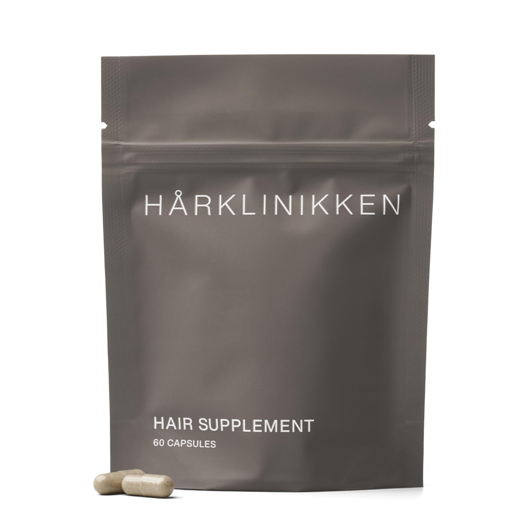 Harklinikken Hair Supplement bottle shown for daily nourishment and consistency