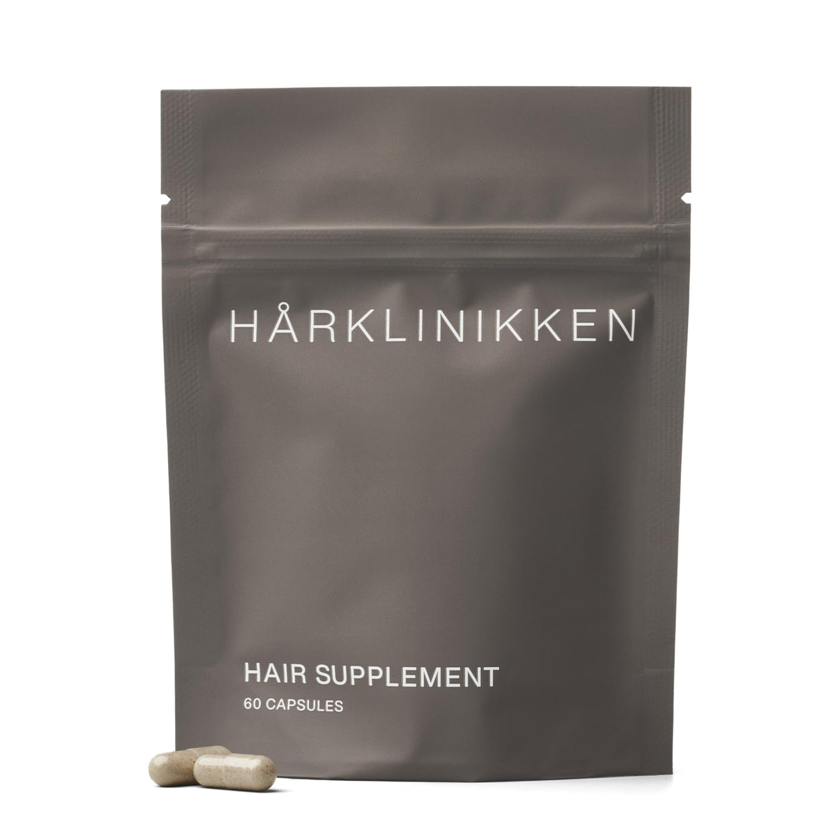 Harklinikken Hair Supplement bottle shown for daily nourishment and consistency