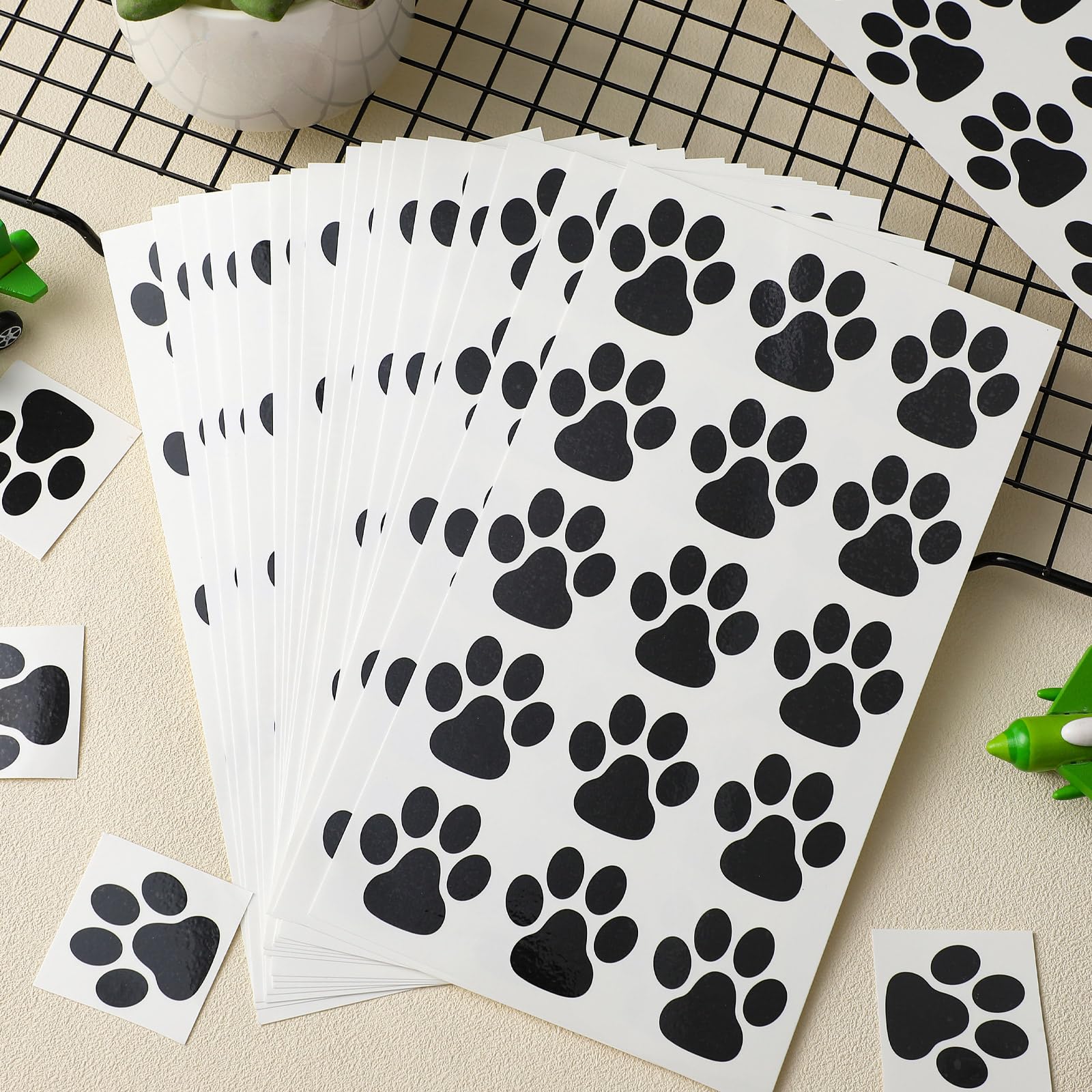 Harloon paw print tattoos shown as party favors display