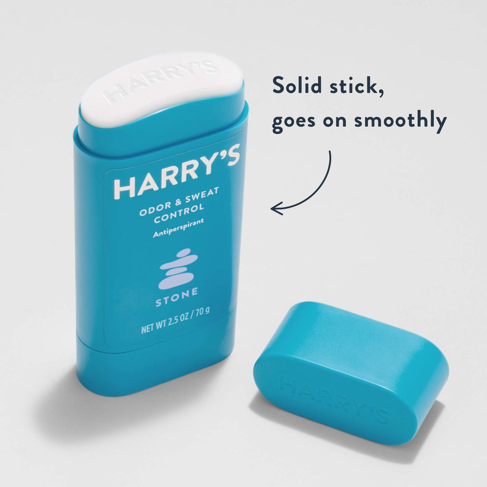Harry's Stone scent notes of yuzu, bergamot, and charcoal in packaging.