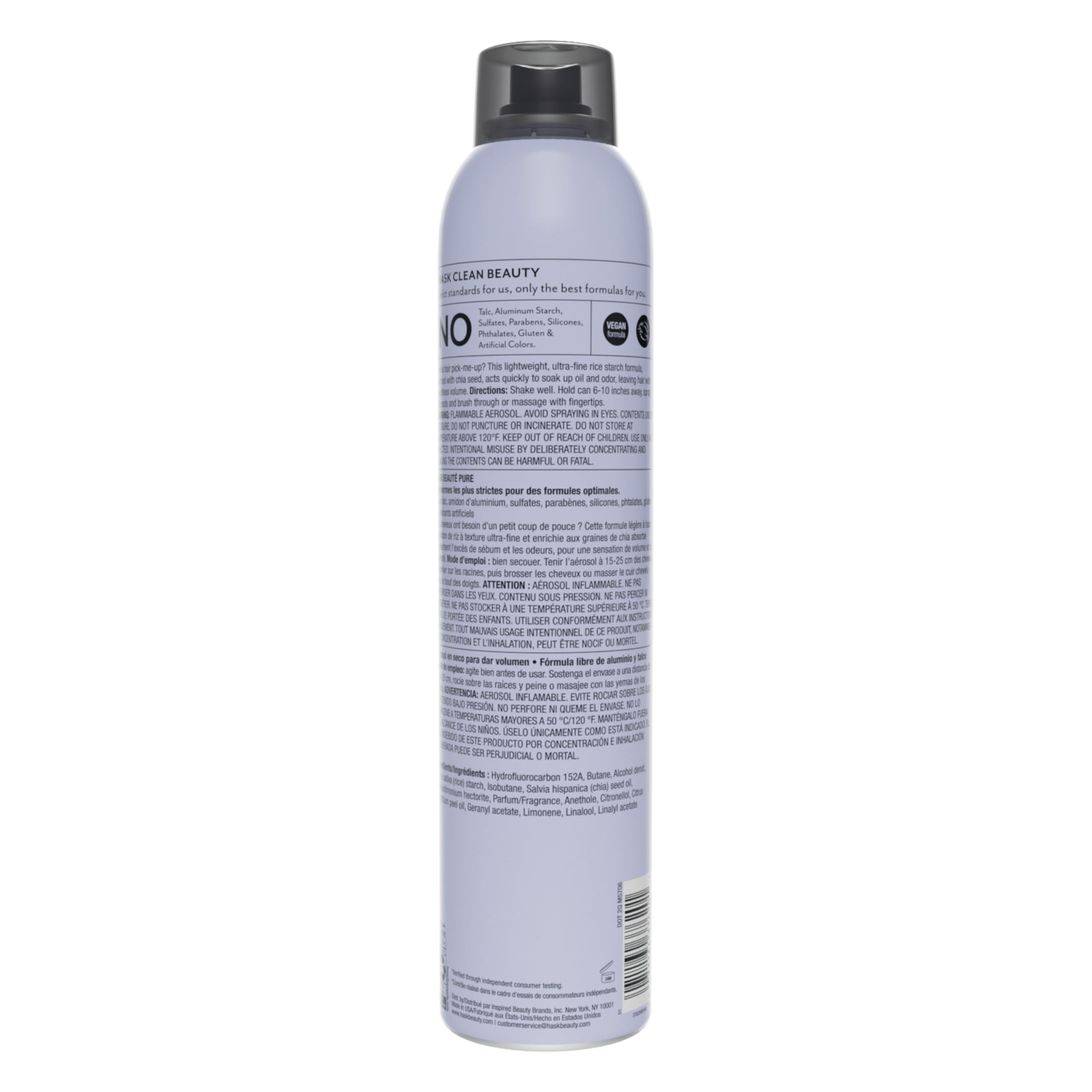 HASK chia seed dry shampoo massaging roots to distribute powder evenly for volume.
