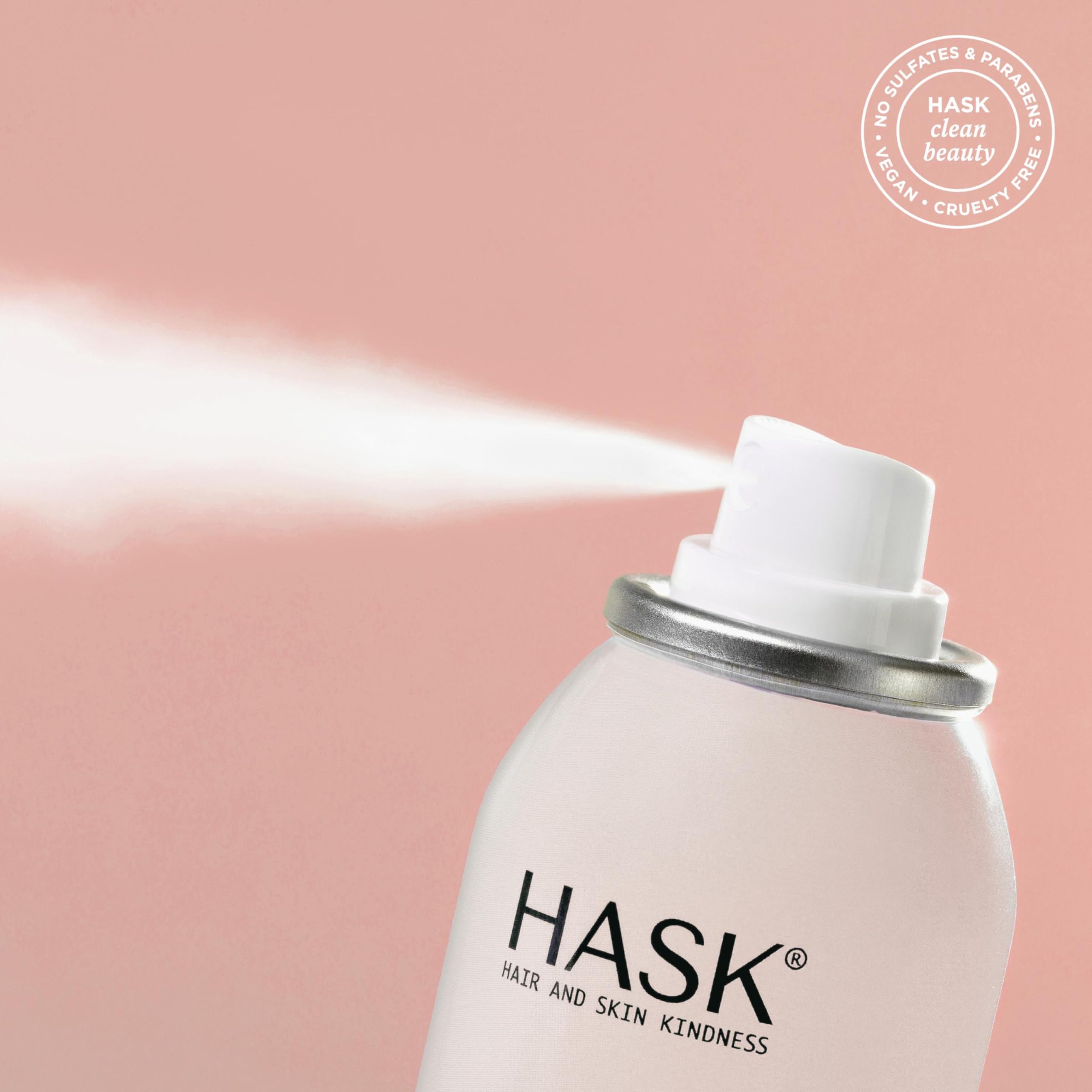 HASK coconut oil nourshing dry shampoo demonstrates root oil absorption for refreshment.