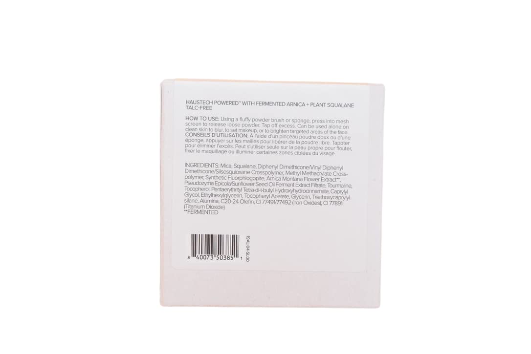 Haus Labs Bio-Blurring loose powder finish photo demonstrates light-reflecting blur without cake.