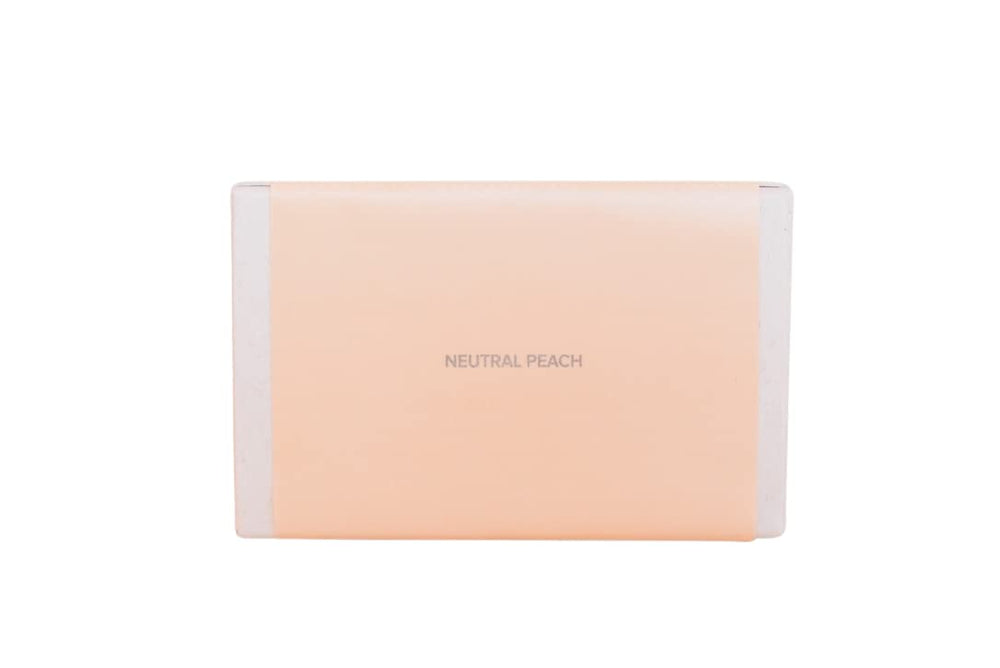 Haus Labs Bio-Blurring neutral peach swatch highlights warm undertones for natural-looking complexion.
