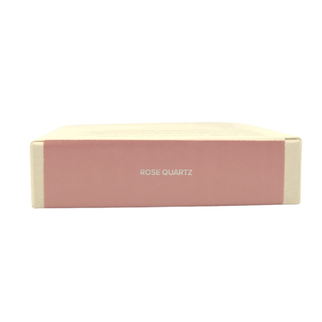 Soft pink pearlescence of Haus Laboratories Rose Quartz highlighter in photos.