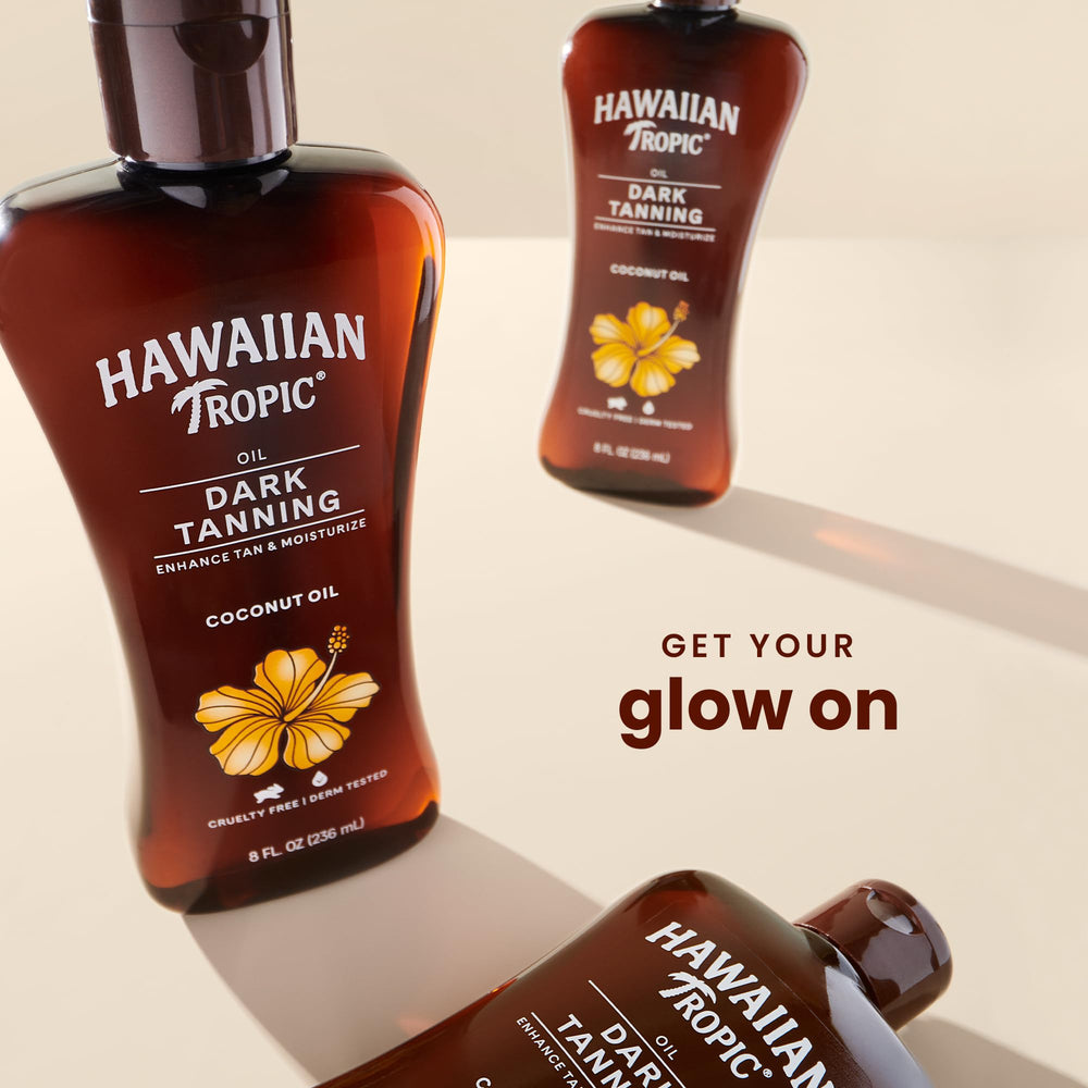 Hawaiian Tropic Dark Tanning Oil being applied for even coverage