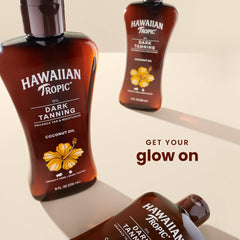Hawaiian Tropic Dark Tanning Oil being applied for even coverage