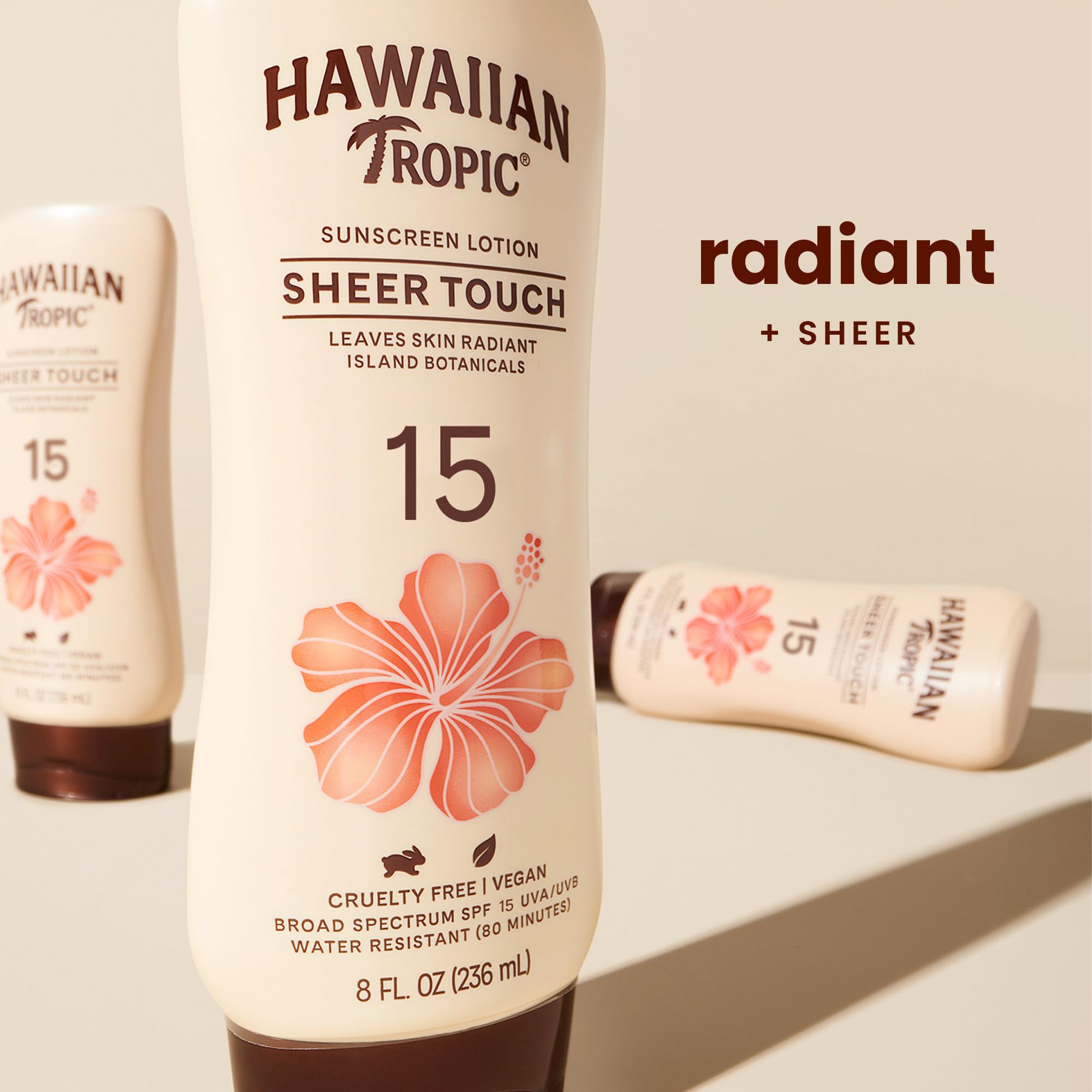 Close-up of Hawaiian Tropic Sheer Touch texture showing light sheen