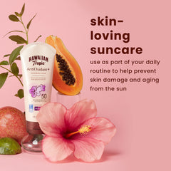 Hawaiian Tropic Skin Defense sunscreen on a beach setting, ideal for outdoor days.