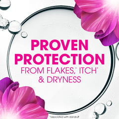 Head & Shoulders Smooth & Silky conditioner bottle for detangling and sleek hair.