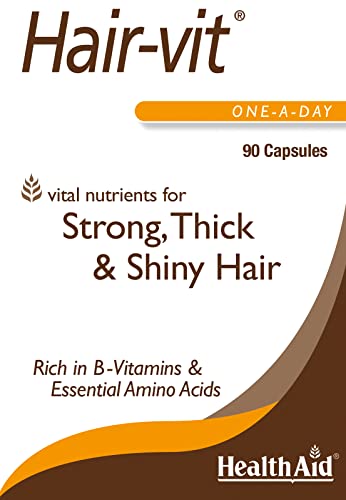 HealthAid Hair-VIT bottle on desk, convenient daily capsule for men and women.