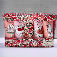 Cassis & Rose hand cream with frangipani and frankincense highlights in open tube