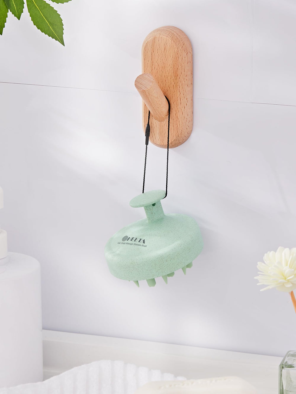 Raised small balls on bristles provide gentle scalp massage.