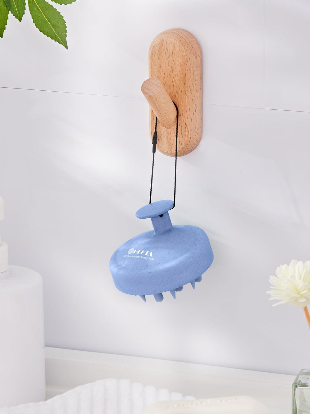 HEETA bristles with raised balls reach scalp roots without snagging hair.
