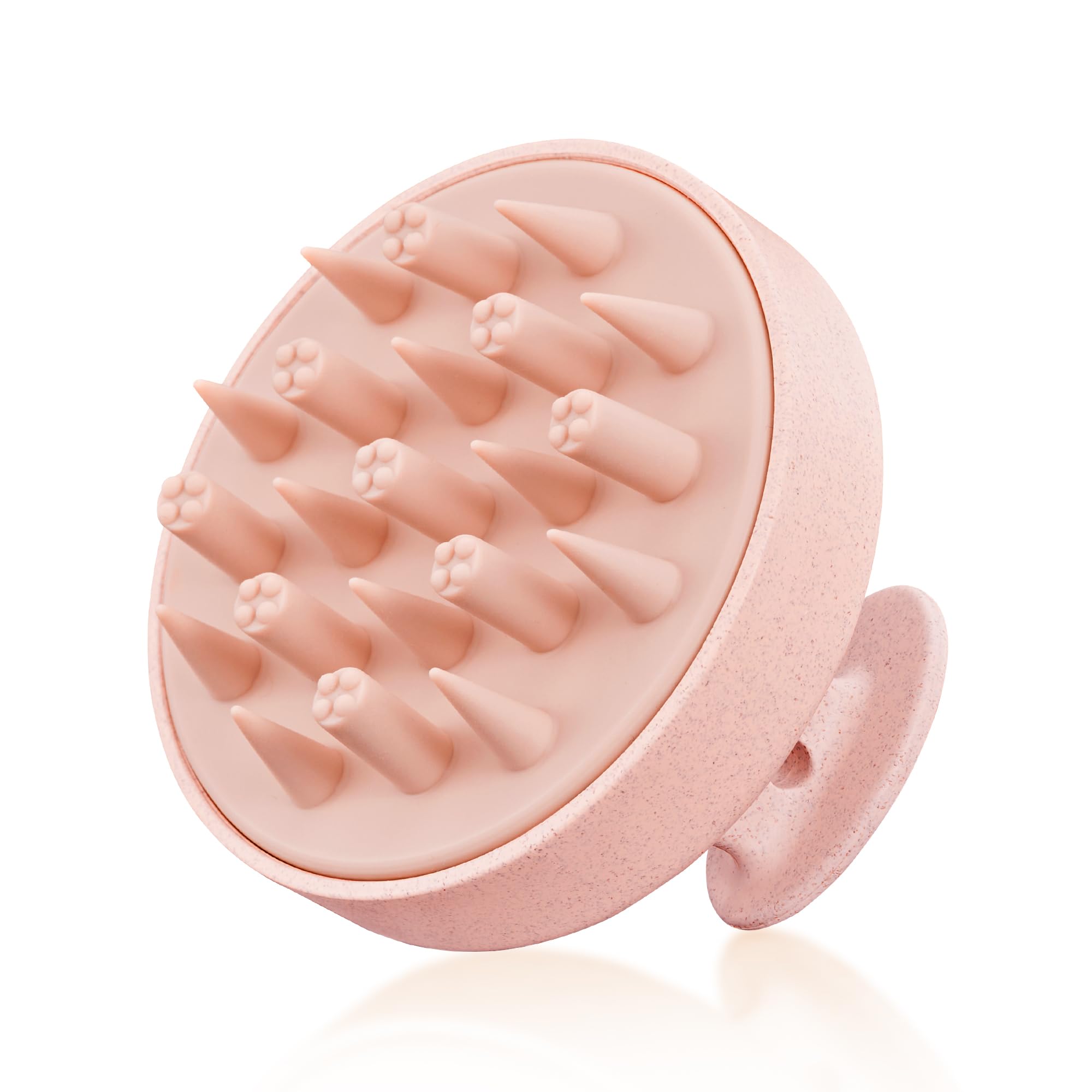 HEETA scalp massager in pink with soft silicone bristles for gentle cleansing.