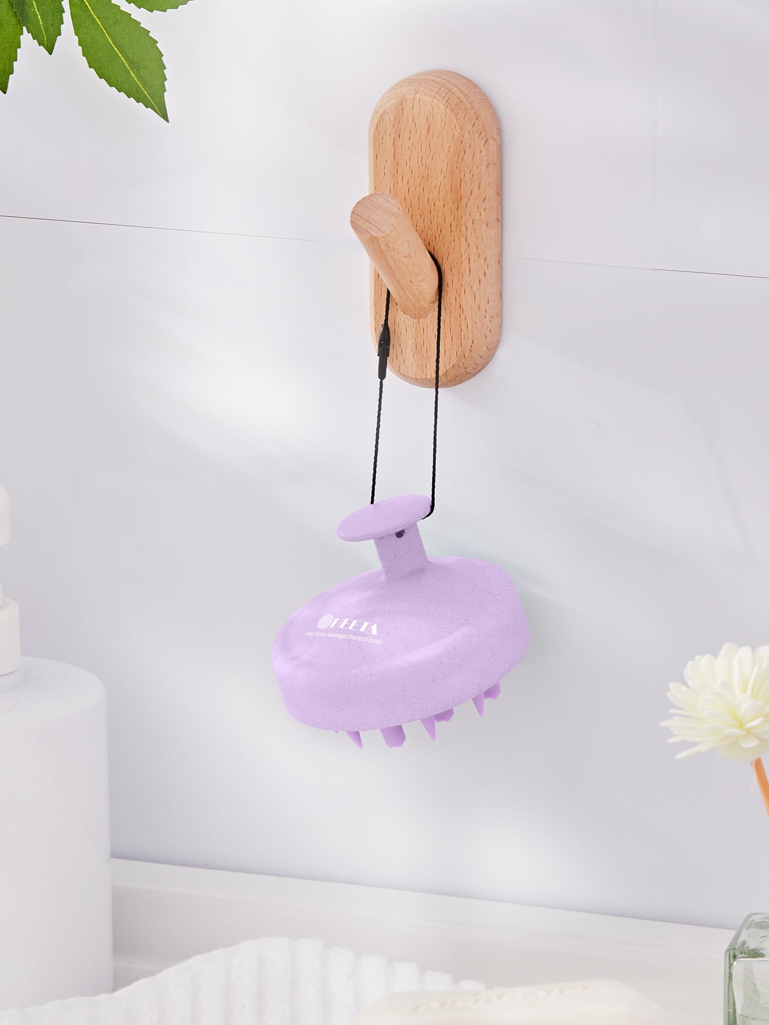 Close-up of raised silicone balls on HEETA bristles for comfortable massage.