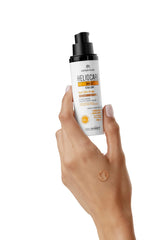 Heliocare 360 Color Gel bronze finish on the hand highlights natural tint and skin-friendly application.