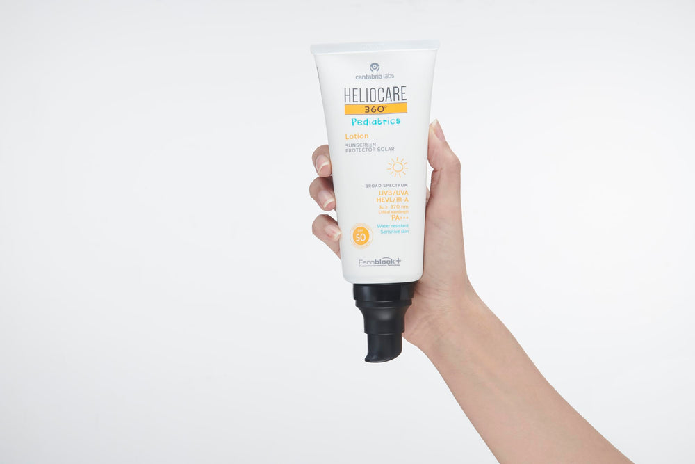 Heliocare 360 Pediatrics Lotion SPF50+ back view with usage guidance