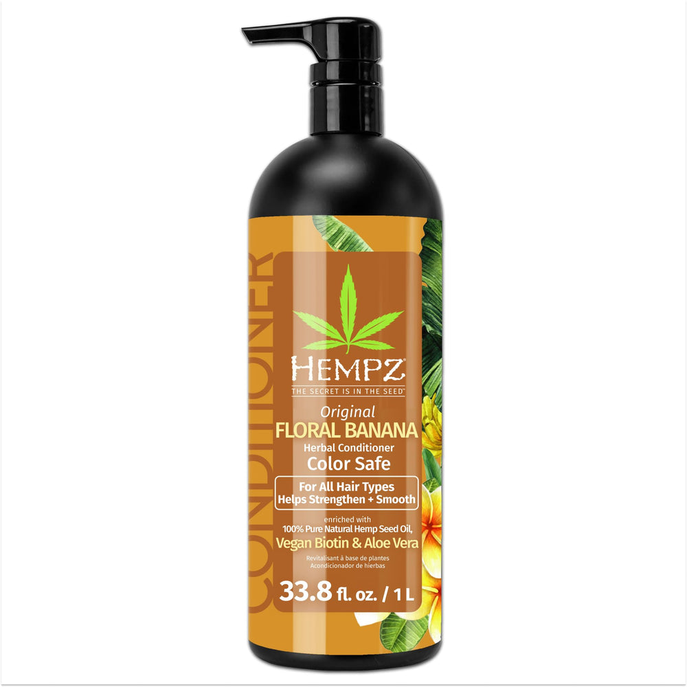 Hempz Biotin Conditioner bottle showcases Original scent and 33.8 oz size for hydration.