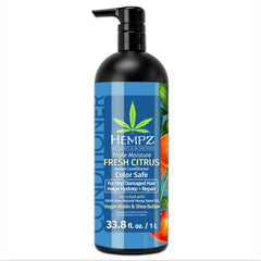 Hempz Biotin Conditioner bottle front showing Triple Moisture formula and citrus scent