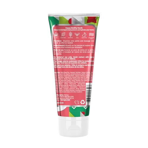 Close-up of Hempz hand cream being applied to hands, showcasing creamy texture.