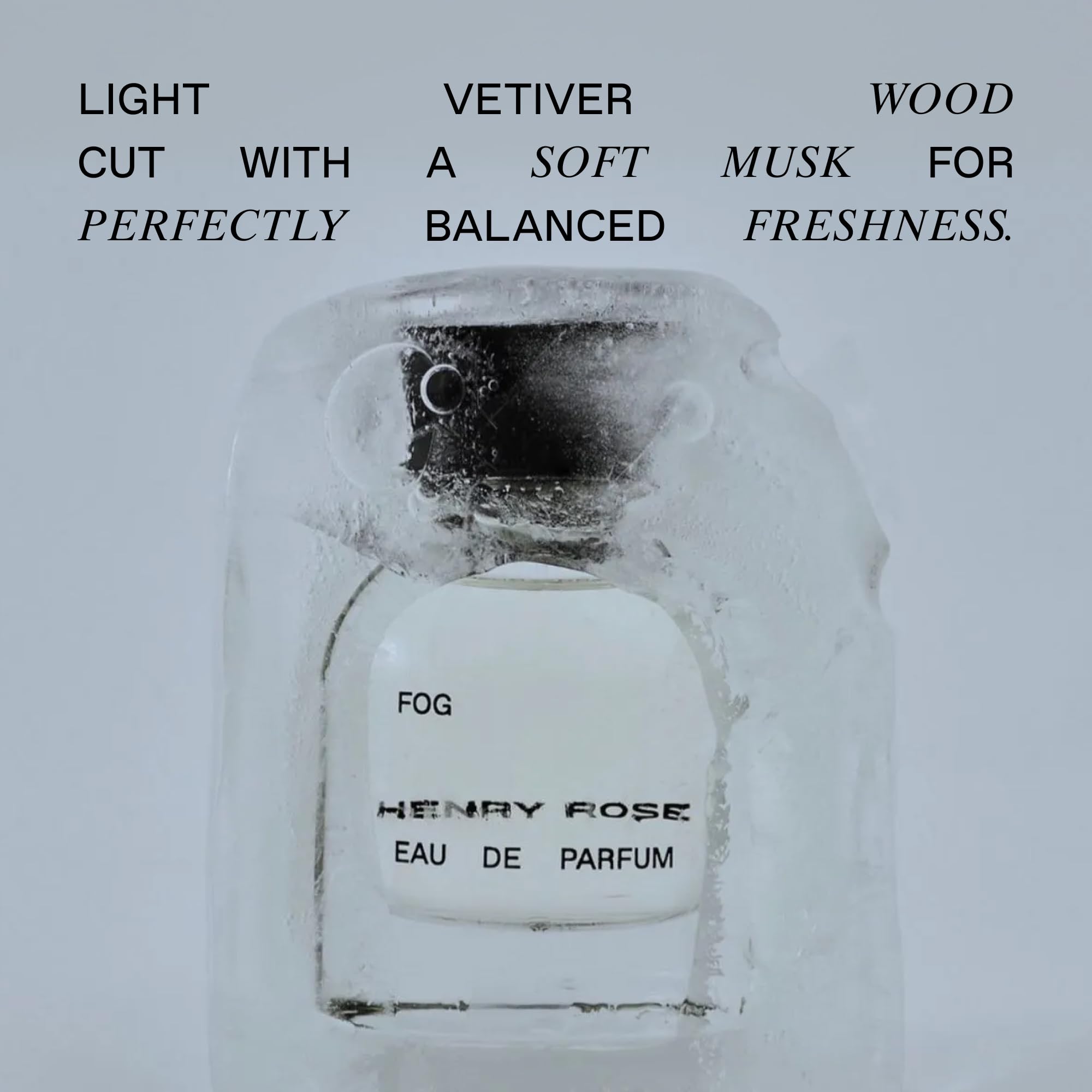 Henry Rose Fog applying-on-wrist demonstrates easy, on-the-go use.