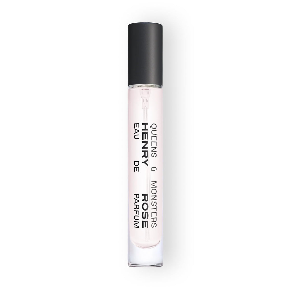 Henry Rose Queens & Monsters travel spray on wrist for on-the-go fragrance touch-ups.