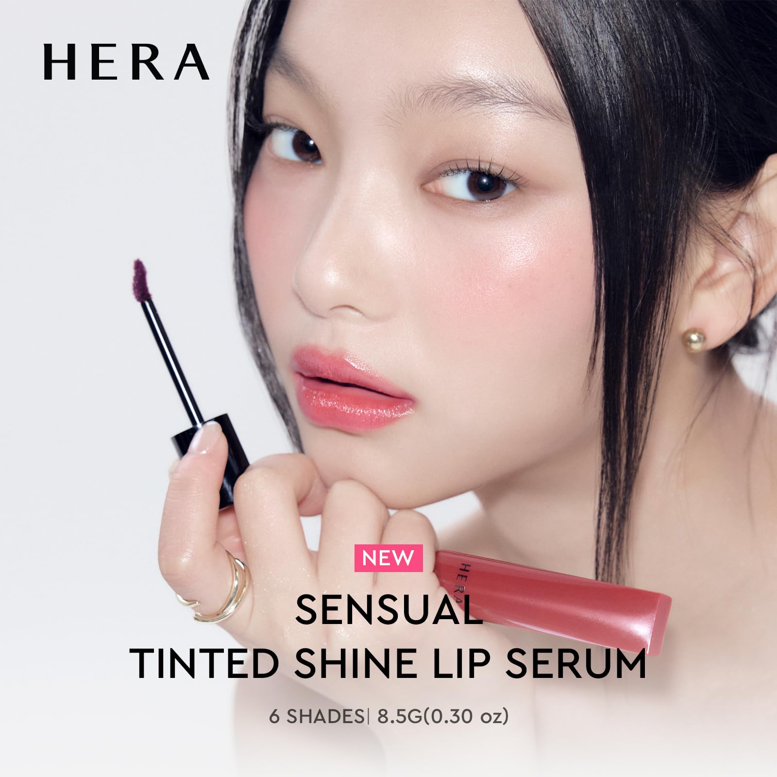 HERA Sensual Tinted Shine Lip Serum swatch on lips with transfer-resistant tint