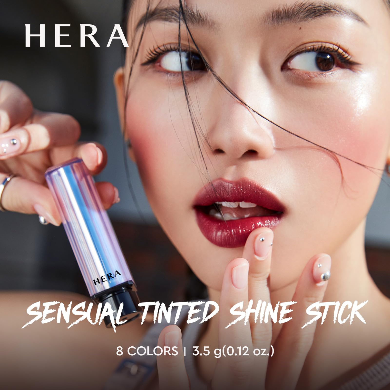 HERA Sensual Tinted Shine Stick swatch shows range from sheer to bold color