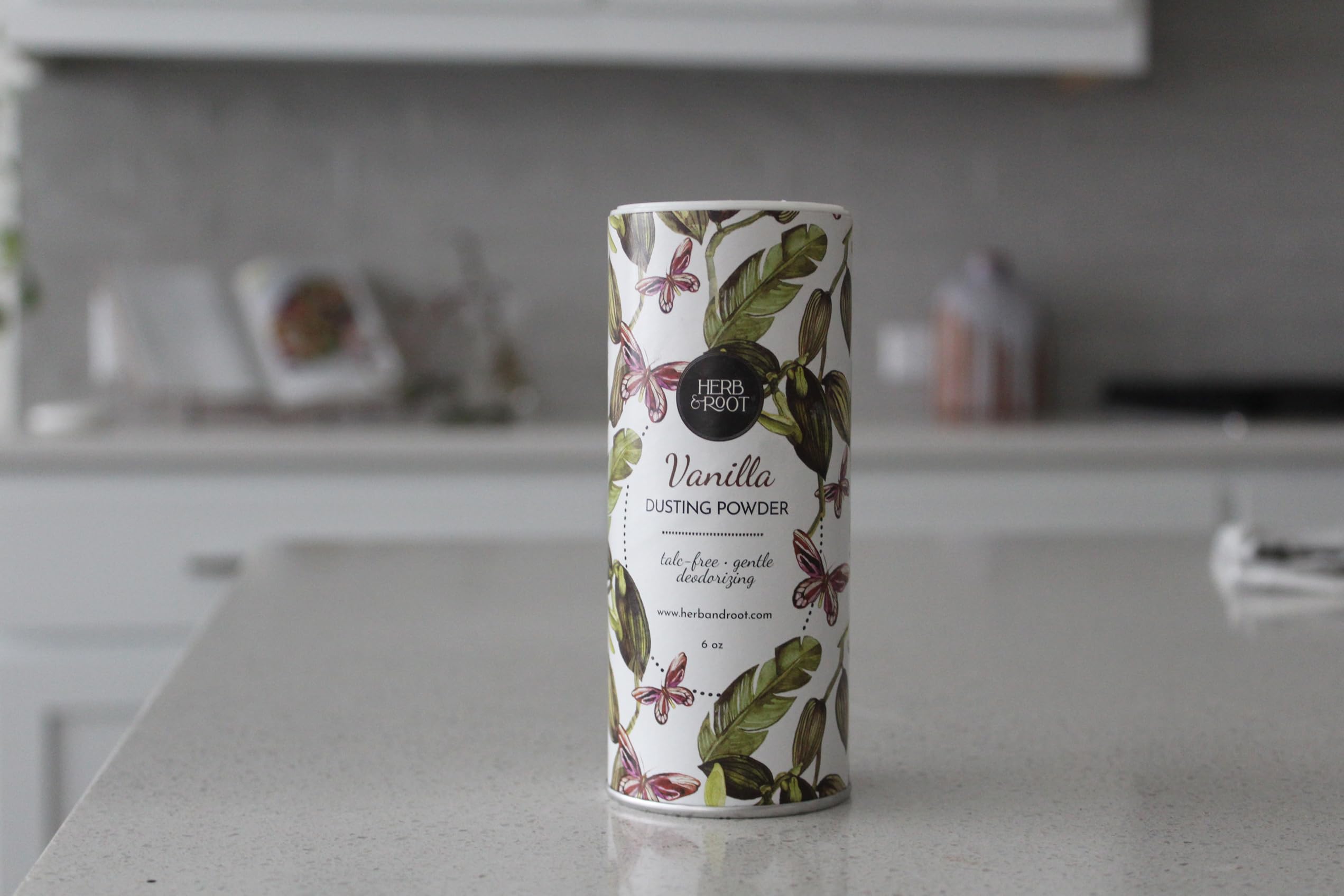 Herb & Root jasmine powder on skin for subtle botanical scent.