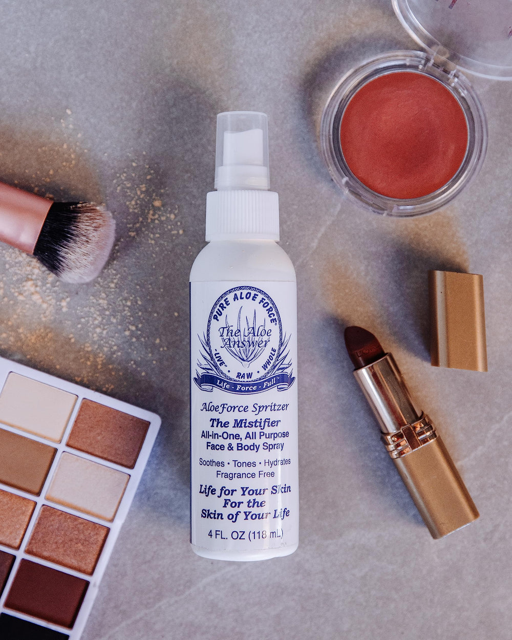 HERBAL ANSWERS Aloe Force used on arms and legs for light moisture and refresh.