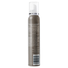 Herbal Essences Biorenew Curl Define Mousse applied to towel-dried hair for curl shaping.
