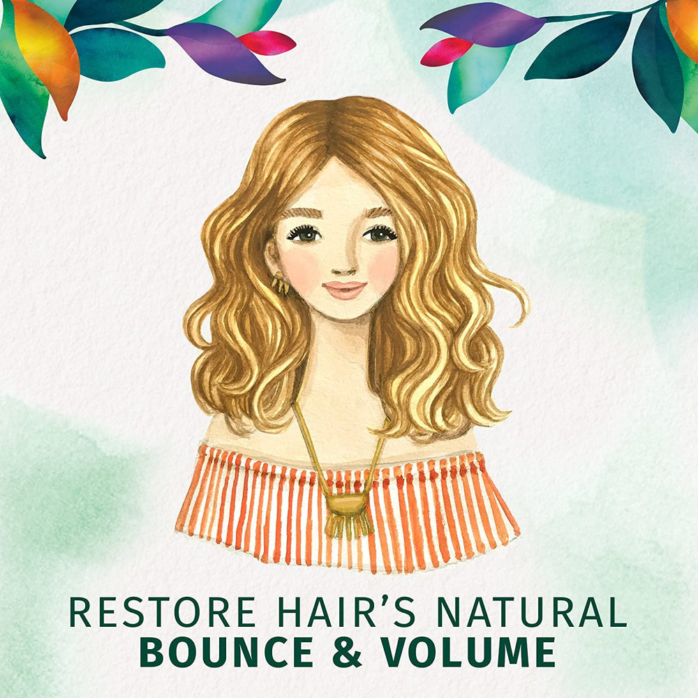 Herbal Essences Body Envy shampoo bottle on sink with bright citrus scent