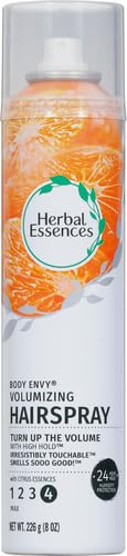 Herbal Essences Body Envy spray application demonstrates quick, even hold for all-day volume.