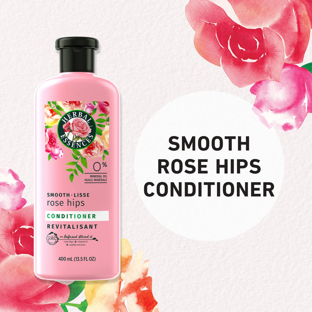 Infused blend of rose hips, vitamin E, and jojoba nourishes strands.