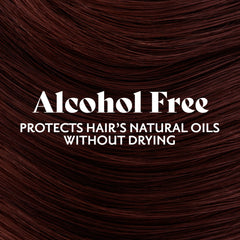 Herbatint 4R Copper Chestnut application with gloves for at-home dyeing.