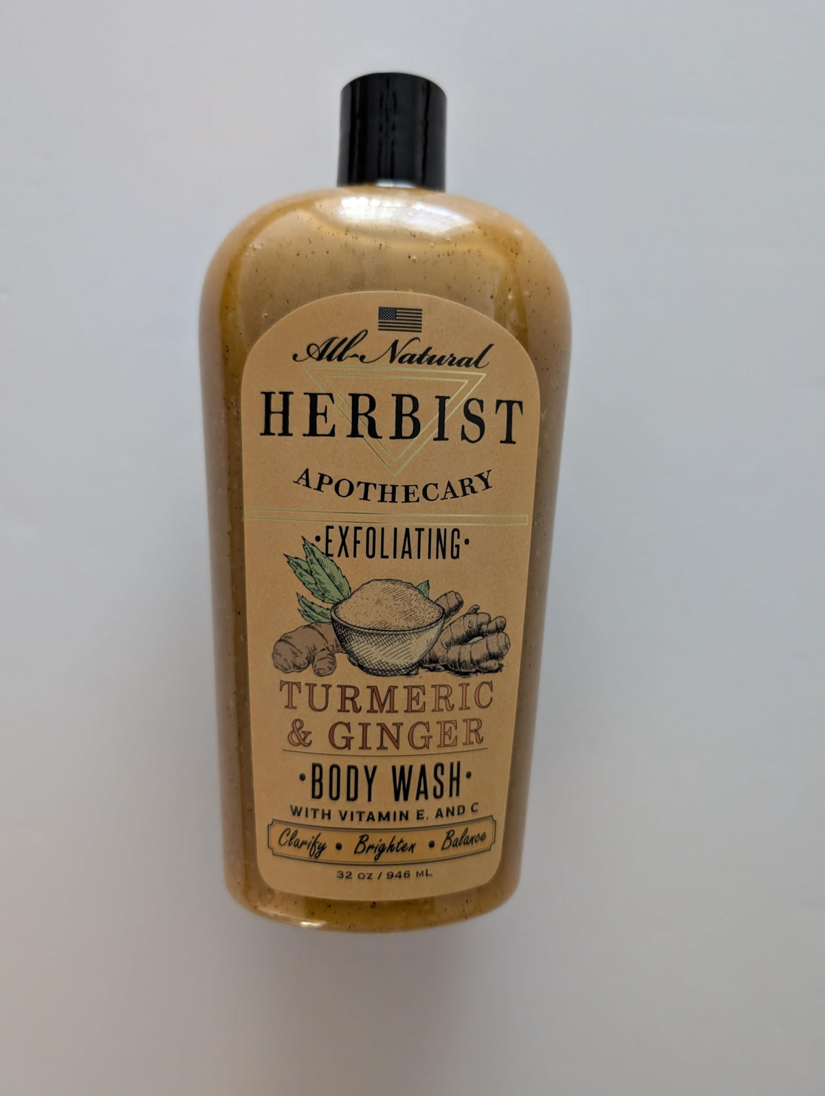 Herbist exfoliating body wash bottle with turmeric and ginger for refreshed, hydrated skin