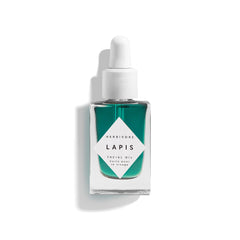 Herbivore Lapis Facial Oil bottle on a clean surface, calming redness and balancing skin.