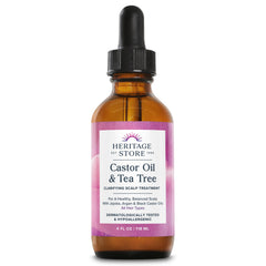 HERITAGE STORE Castor Oil & Tea Tree Oil scalp treatment bottle on display for balanced scalp and nourished hair