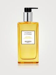 Hermès Un Jardin a Cythere bottle pour detail highlighting refill option.